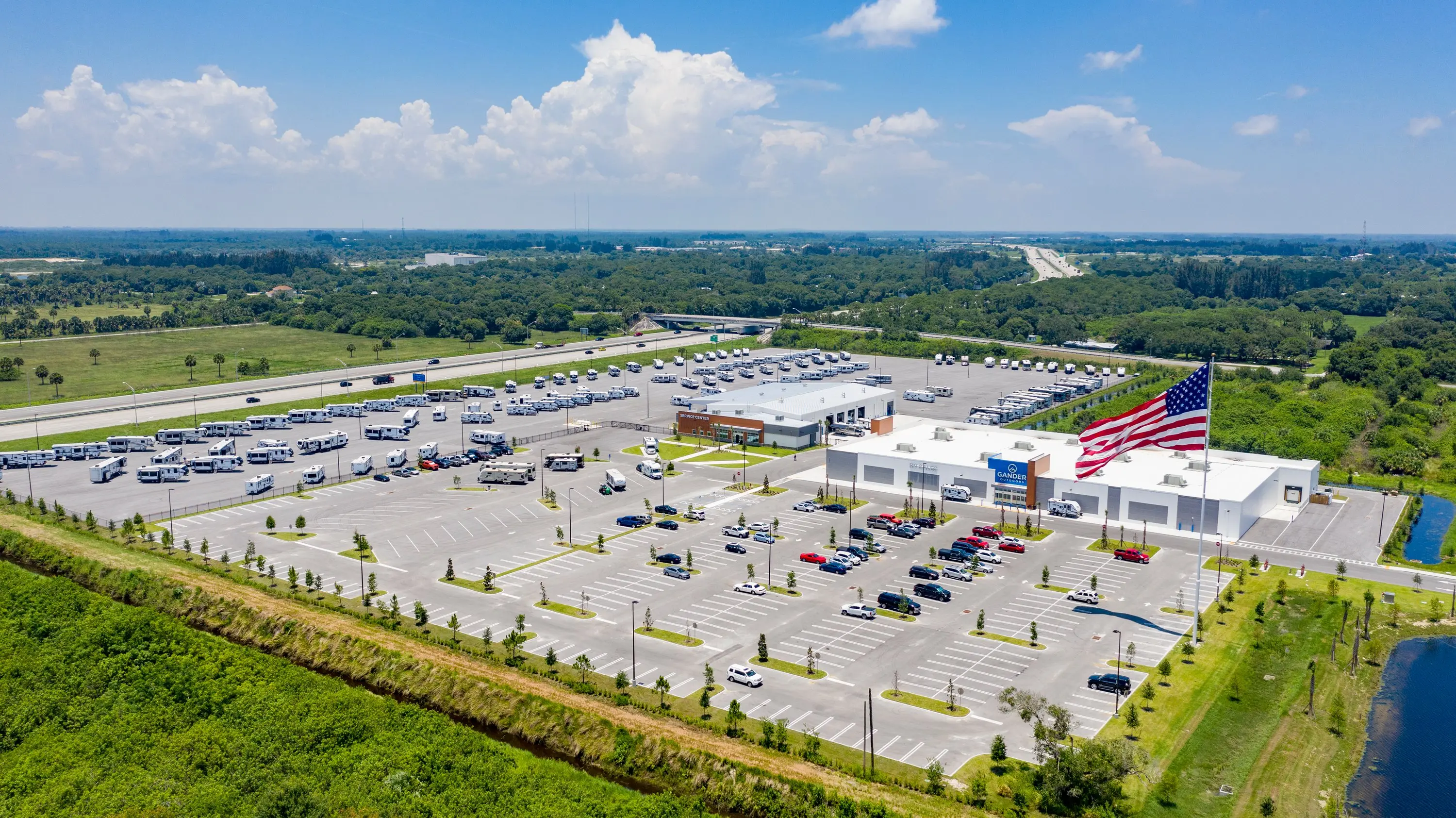Aerial view of Gander Outdoors Fort Pierce and its parking lot