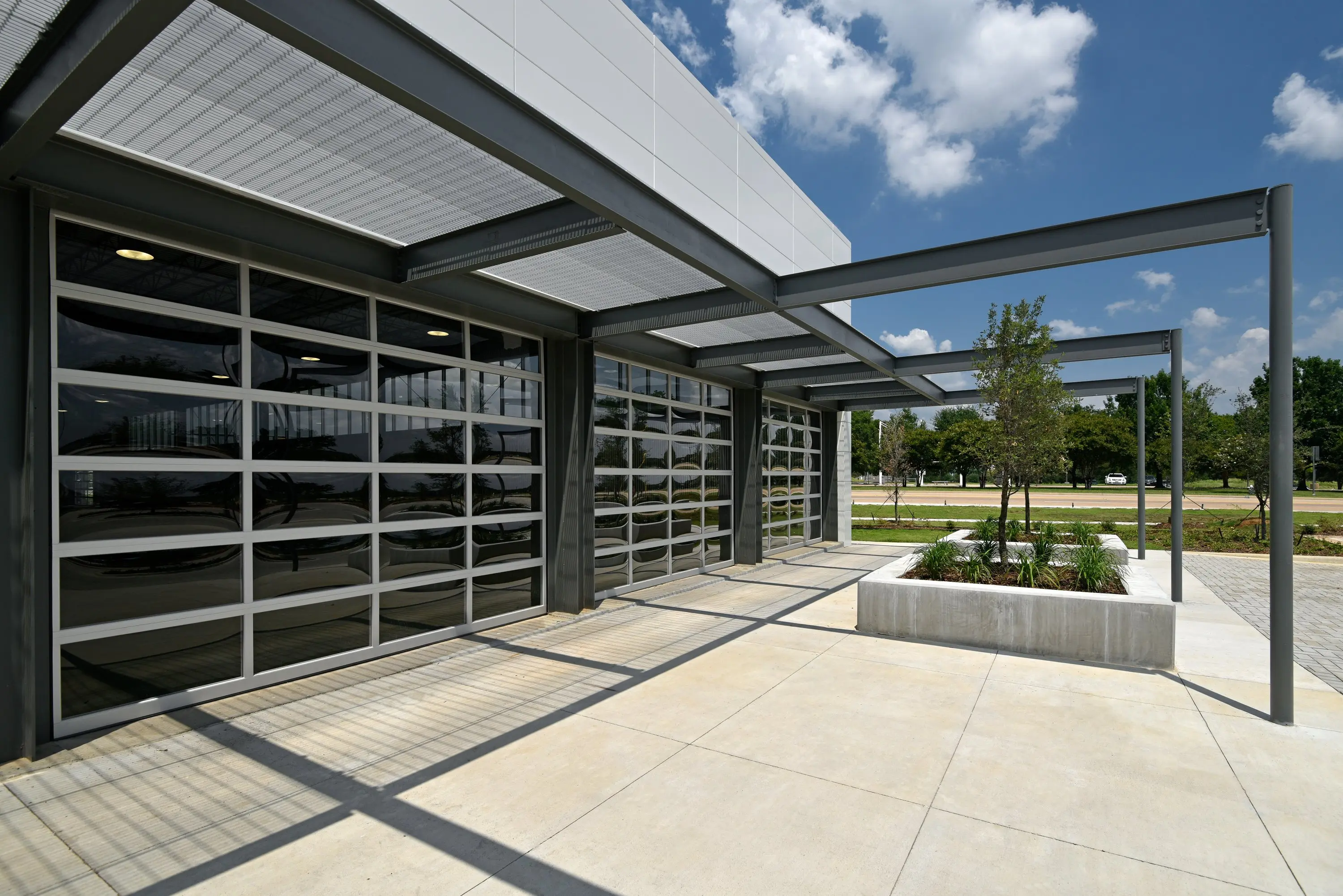 Covered patio and glass roll-up doors at ATH Arlington